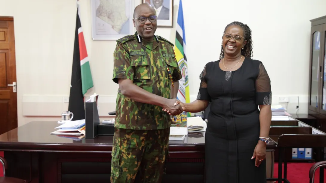 PS Anne Wang'ombe with Deputy Inspector General of Police Eliud Lagat